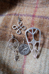 Silver Pendants and a Brooch