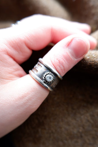Sterling silver Pictish ring with faceted topaz.