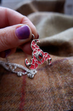 Load image into Gallery viewer, Sterling silver Zoomorphic triskellion from Faversham with Enamel and garnet