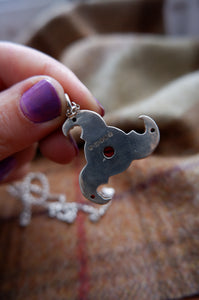 Sterling silver Zoomorphic triskellion from Faversham with Enamel and garnet