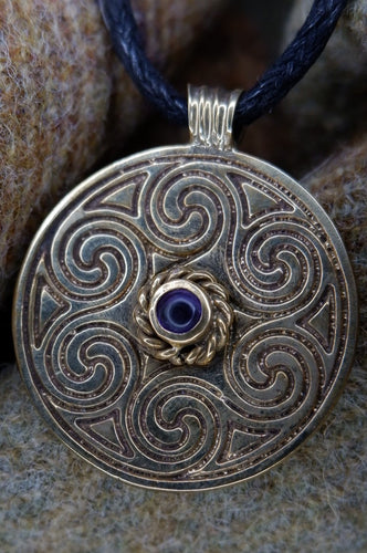 Unique Aberlemno swirl Pictish pendant in gold plated bronze and amethyst