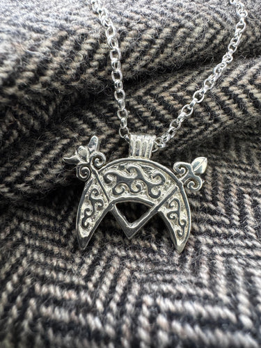 Pictish V-rod and Crescent Pendant from Cairnton
