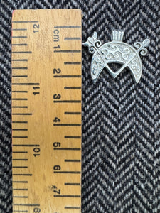 Pictish V-rod and Crescent Pendant from Cairnton