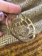 Load image into Gallery viewer, Frankish openwork belt mount in brass. Sunwheel?
