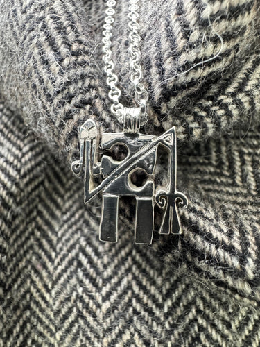 Tyrie Raven Stone symbol pendant