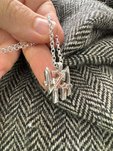 Tyrie Raven Stone symbol pendant