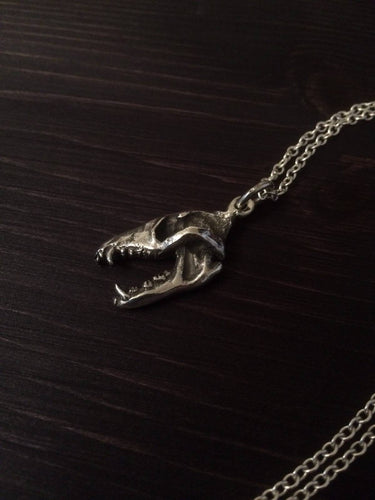 One Sided Wolf skull pendant in bronze