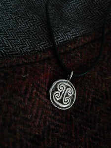 Skinnet Pictish stone symbol in sterling silver.