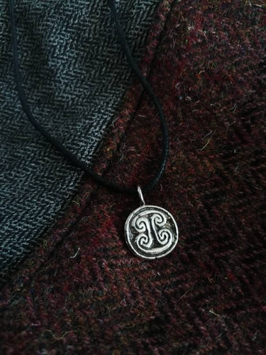 Skinnet Pictish stone symbol in sterling silver.